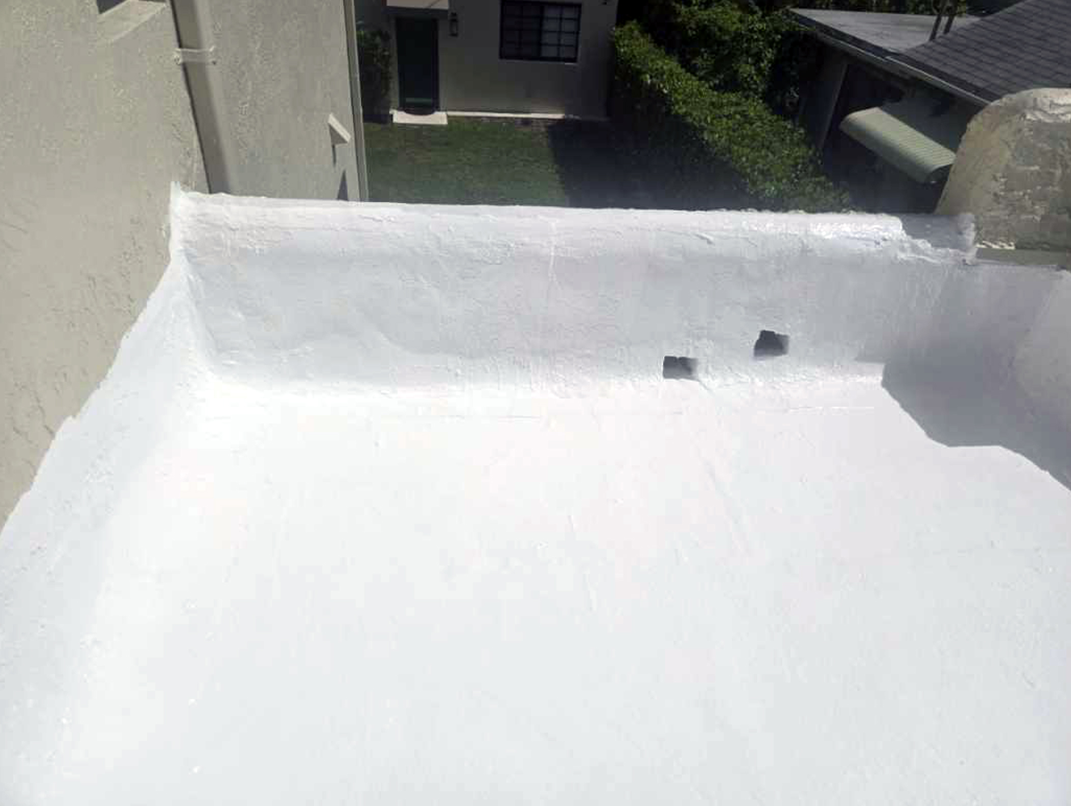 Cropped photo of silicone coating on a roof.